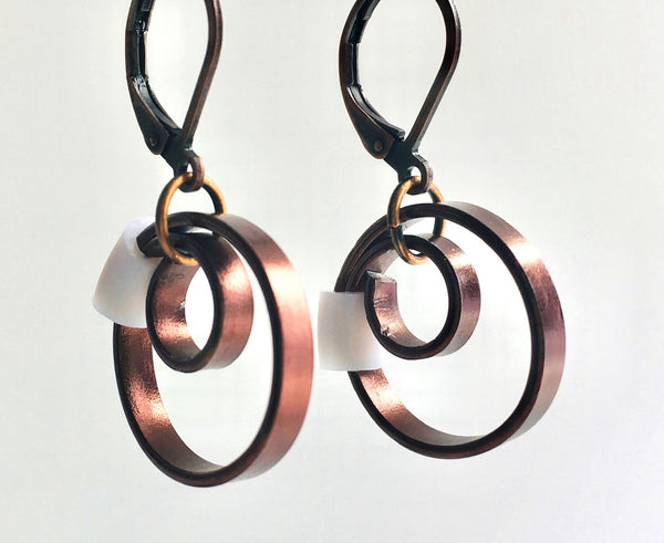 These Reel with a white accent hang about 2cm.