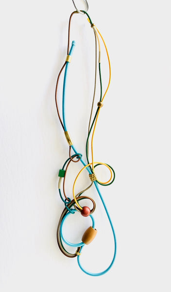 Once Made Necklace: Connecting Necklace in Light Blue, Brown Green and Gold