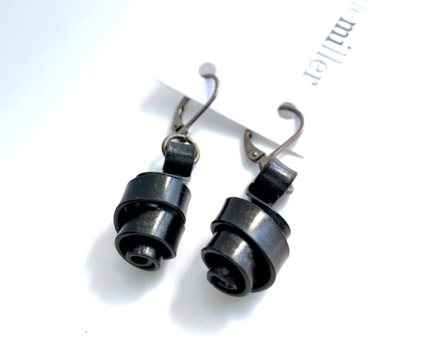 These Loopt earrings are super light weight and hang about 2cm long. They are made of aluminum wire.