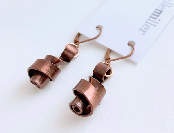 These Loopt earrings are super light weight and hang about 2cm long. They are made of aluminum wire.