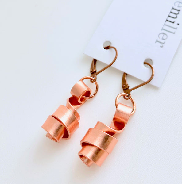 These Loopt earrings are super light weight and hang about 2cm long. They are made of aluminum wire.