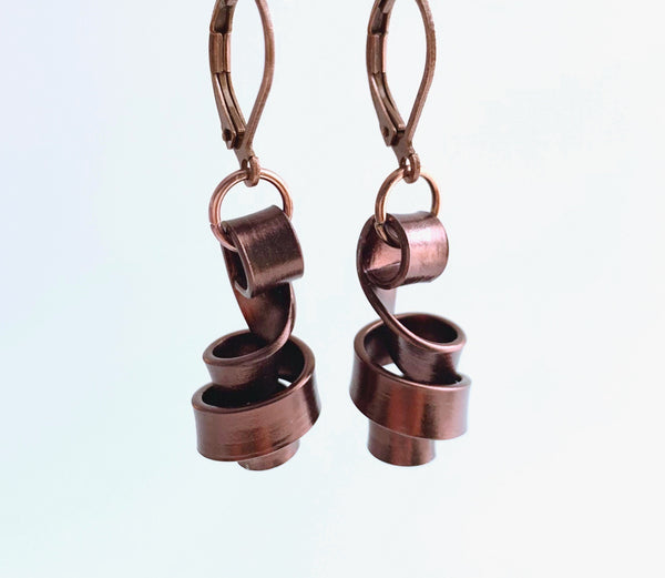 These Loopt earrings are super light weight and hang about 2cm long. They are made of aluminum wire.