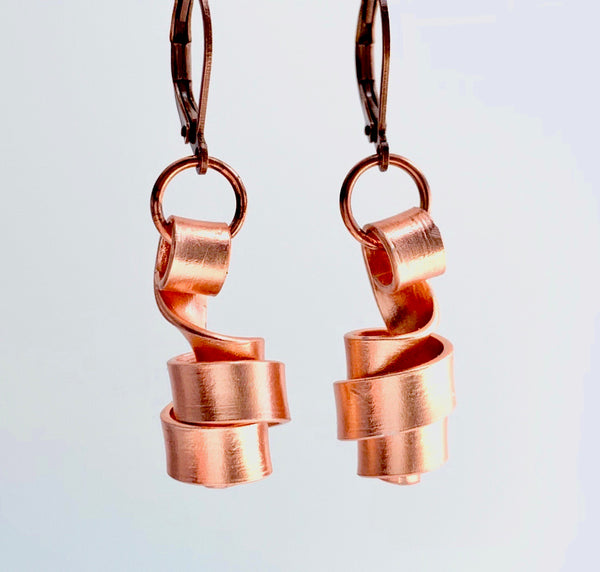 These Loopt earrings are super light weight and hang about 2cm long. They are made of aluminum wire.