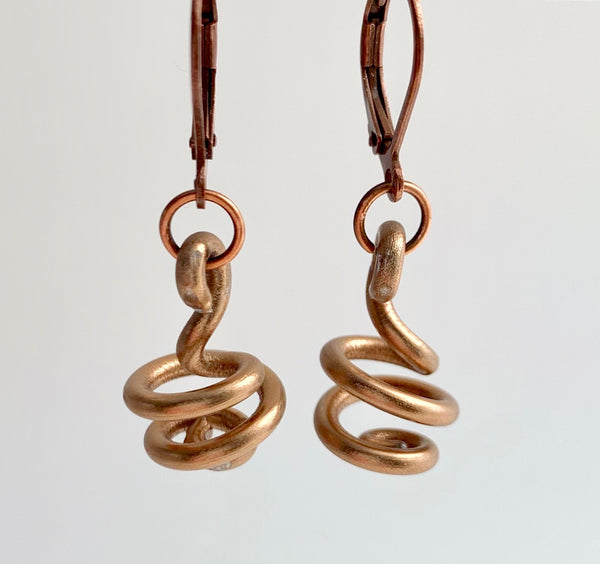 These Loopt earrings are super light weight and hang about 2cm long. They are made of aluminum wire.