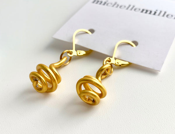 These Loopt earrings are super light weight and hang about 2cm long. They are made of aluminum wire.