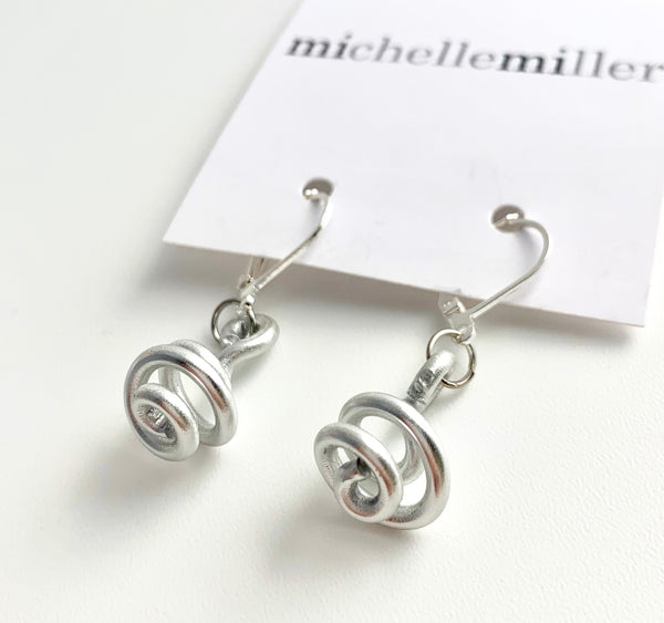 These Loopt earrings are super light weight and hang about 2cm long. They are made of aluminum wire.