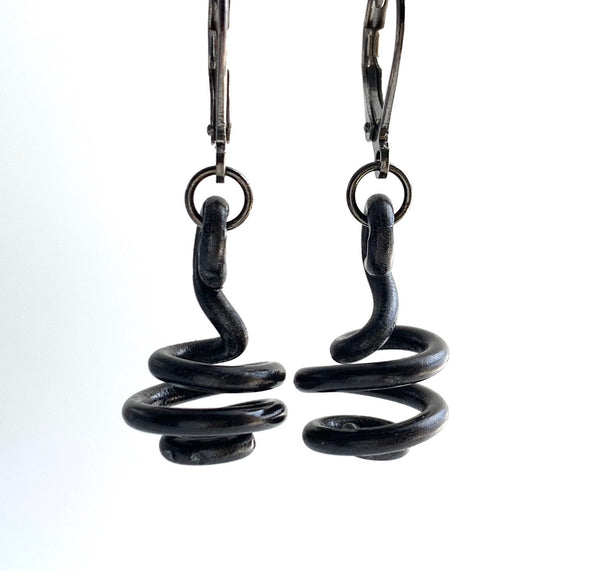 These Loopt earrings are super light weight and hang about 2cm long. They are made of aluminum wire.  