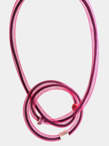This Tubular is made with black shock cord and berry red netted tubing. it is 115cm