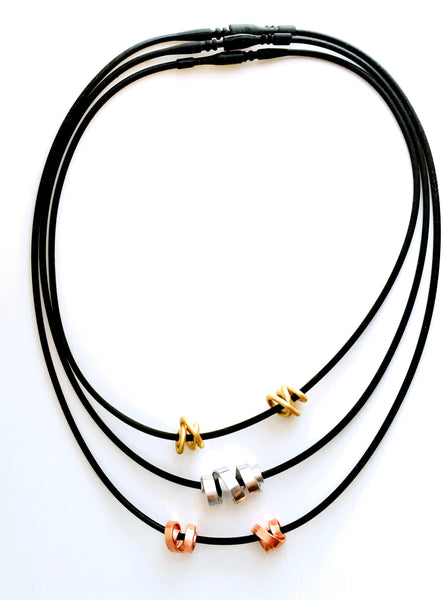 This picture shows all the different wire types  as well as the different lengths of the rubber necklaces.
