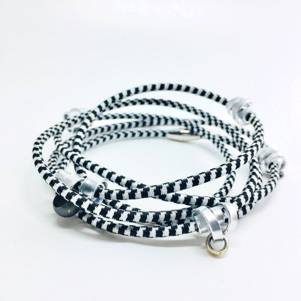 This is a 112cm Loopt in fine black and white cord with a mix of flat and thin silver aluminum wire.
