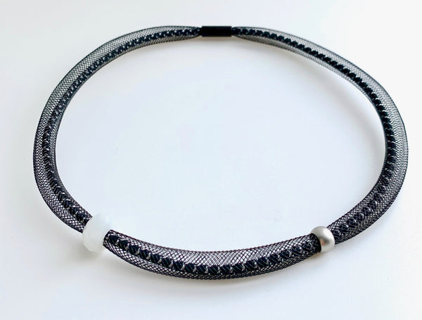 This Short Tubular is made with black/white shock cord and black netted tubing. it is 44cm