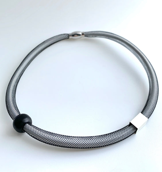 This Short Tubular is made with white shock cord and black netted tubing. it is 43cm