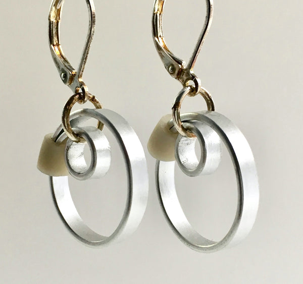 These Reel with a beige accent hang about 2cm.