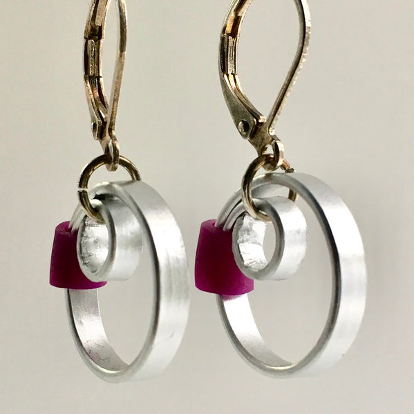 These Reel with a purple accent hang about 2cm.