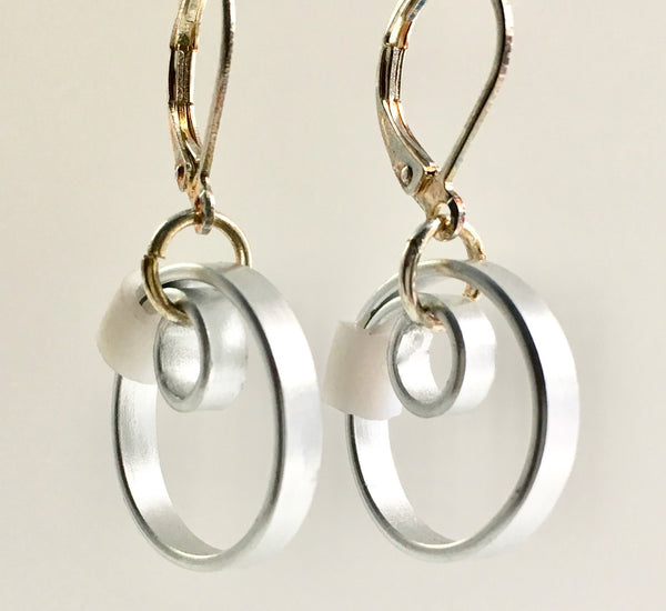 These Reel with a white accent hang about 2cm.