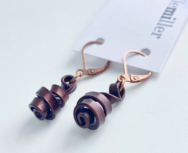 These Loopt earrings are super light weight and hang about 2cm long. They are made of aluminum wire.