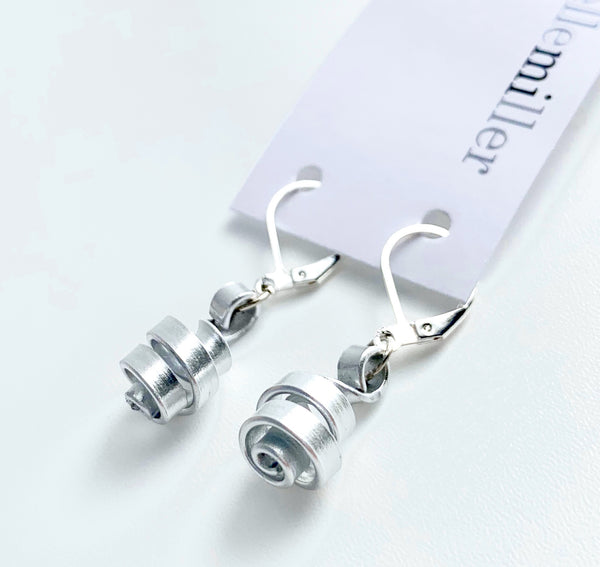 These Loopt earrings are super light weight and hang about 2cm long. They are made of aluminum wire.