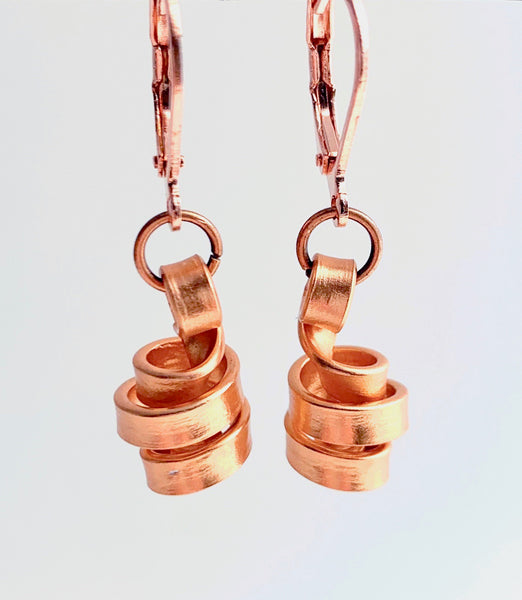 These Loopt earrings are super light weight and hang about 2cm long. They are made of aluminum wire.