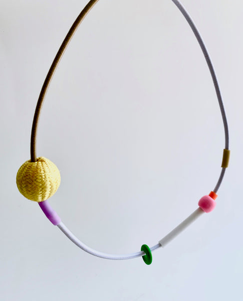 This piece is made on 3mm shock cord and has an interlocking magnetic clasp. It is 50 cm in length.