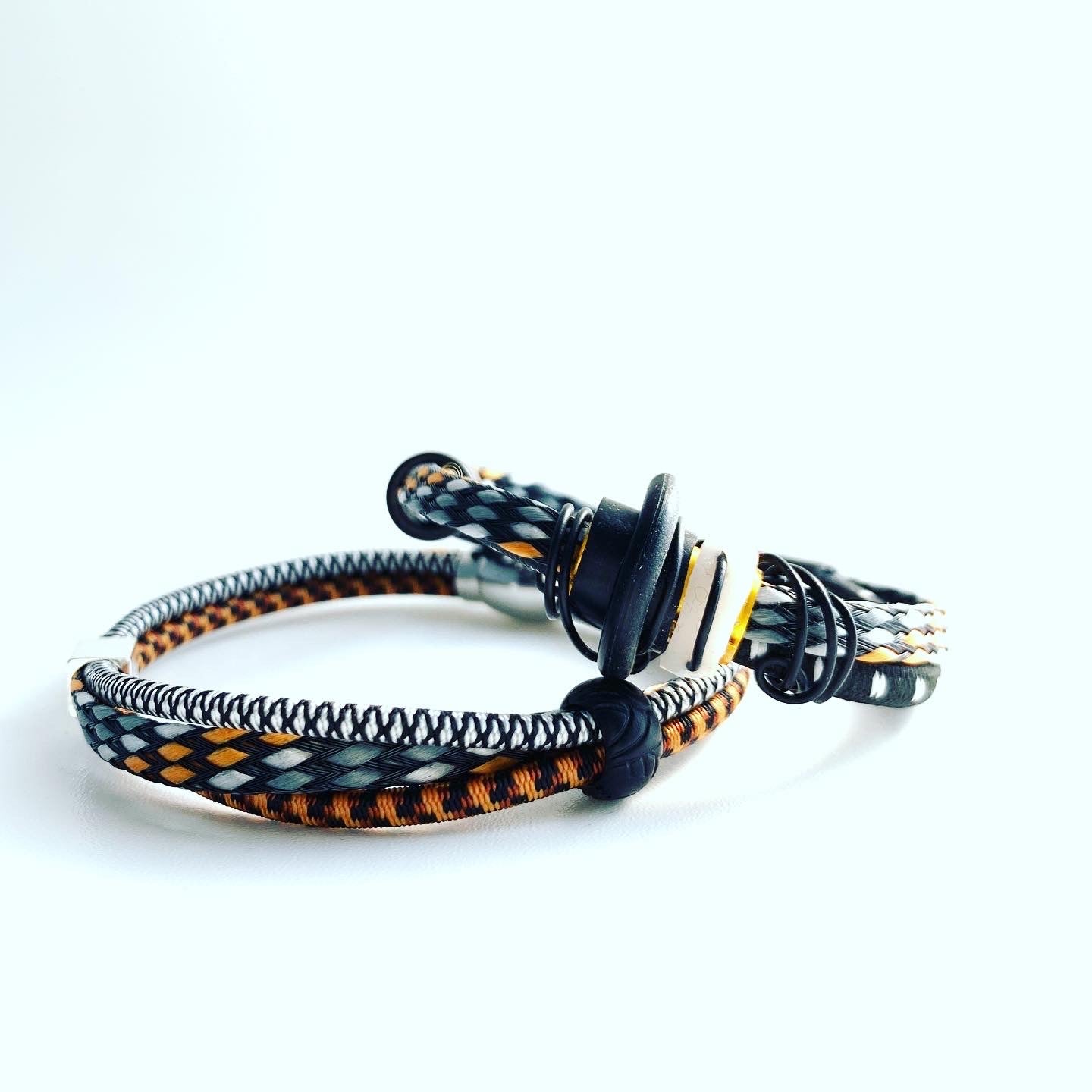 a beautiful black cable connected bracelets