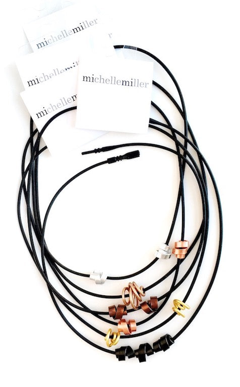 a beautiful black connected necklaces