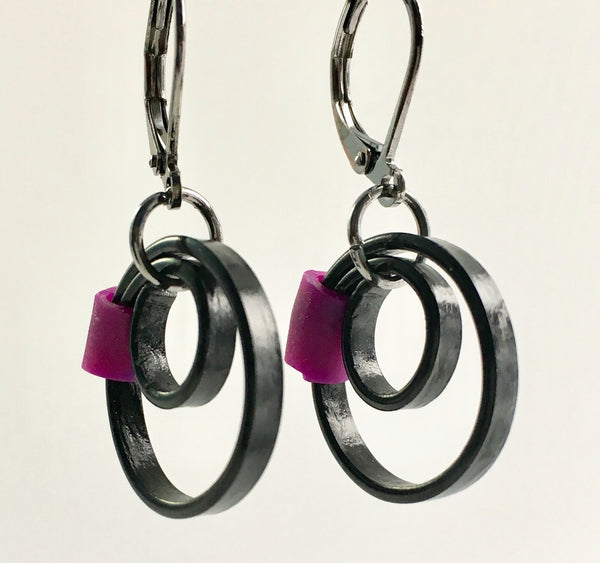 These Reel earrings with a purple accent are a simple fairly small earring that hangs 2cm long.