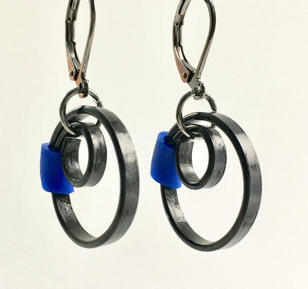 These Reel earrings with a royal blue accent are a simple fairly small earring that hangs 2cm long.