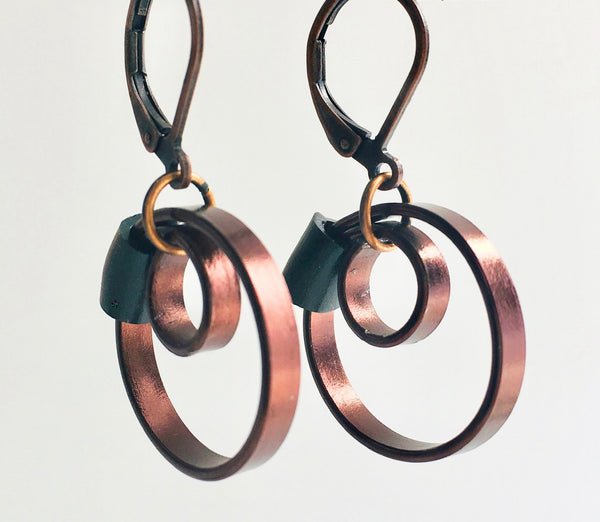 These Reel earrings with a black accent are a simple fairly small earring that hangs 2cm long.