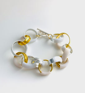 Bubbles: Bubble Bracelet in gold+silver with white