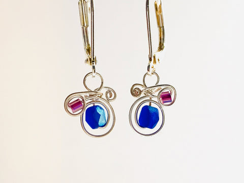 Classic MiMi earrings in silver coated copper wire with blue irridescent glass bead.