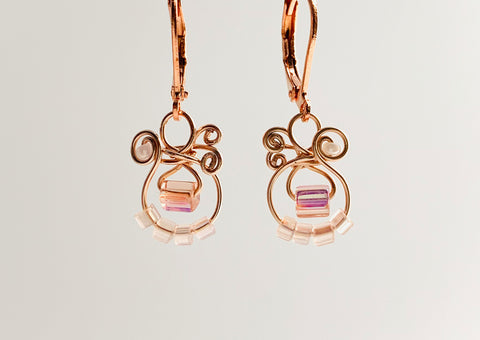 Classic MiMi earrings in Rose Gold coloured copper wire with irridescent faceted blush glass and tiny soft blush glass beads