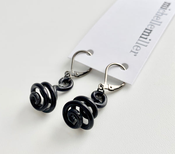 These Loopt earrings are super light weight and hang about 2cm long. They are made of aluminum wire. 