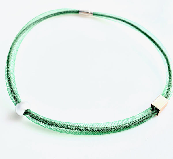 This Short Tubular is made with taupe shock cord and green netted tubing. it is 46.5cm