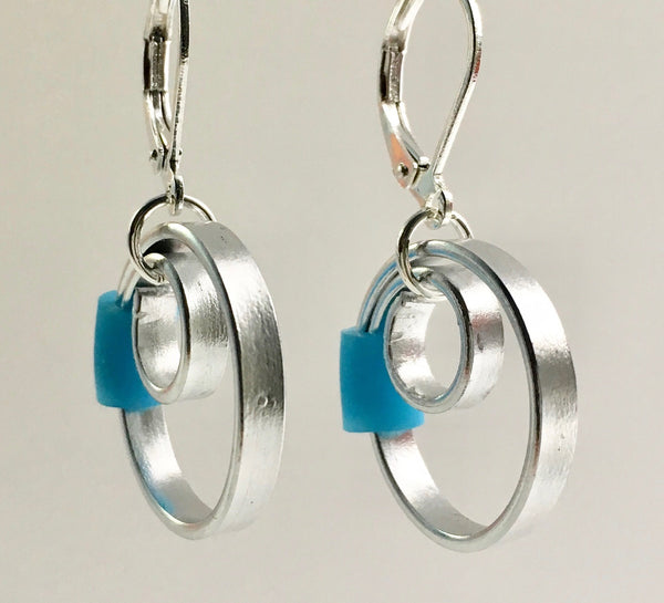 These Reel with a turquoise accent hang about 2cm.