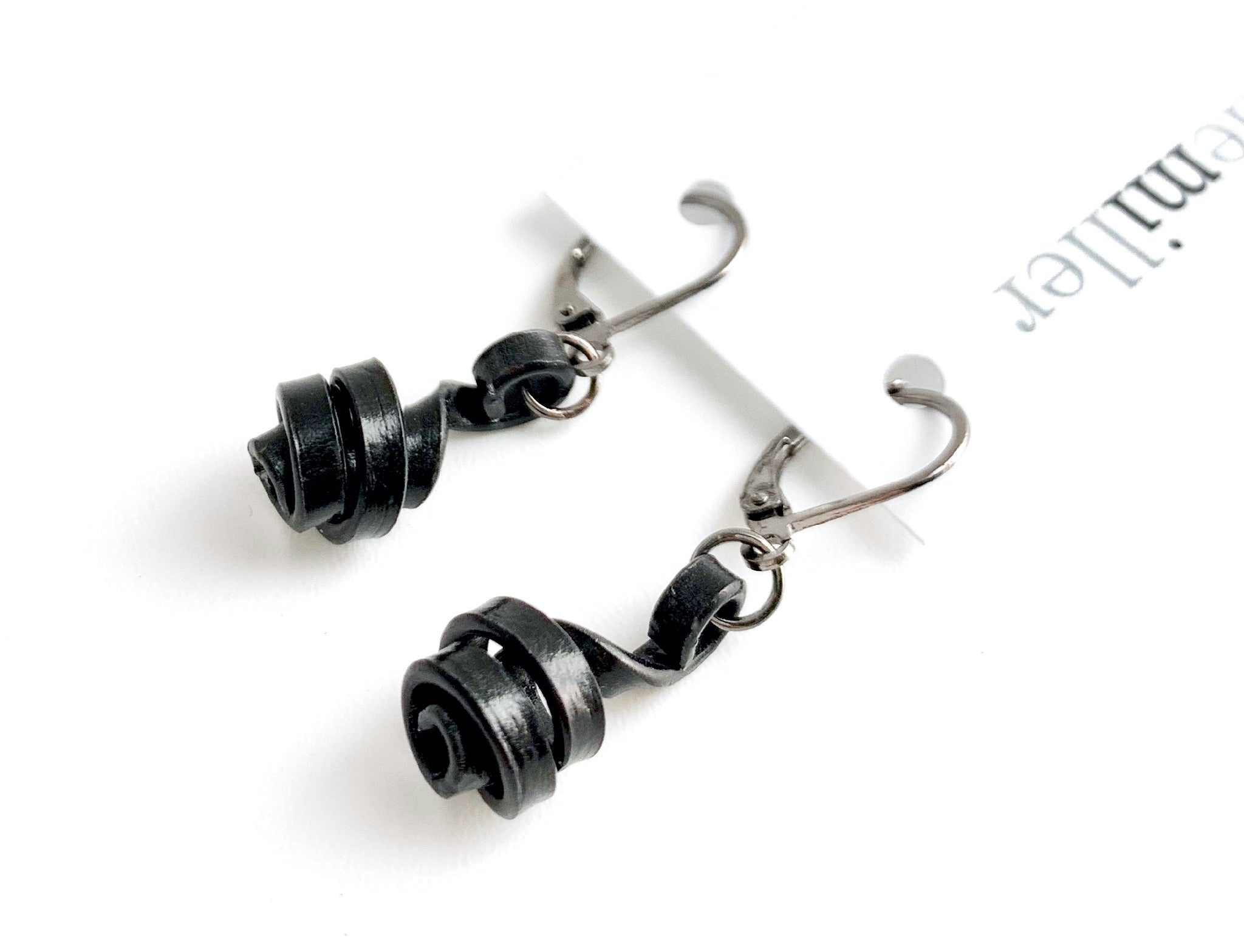 These Loopt earrings are super light weight and hang about 2cm long. They are made of aluminum wire.
