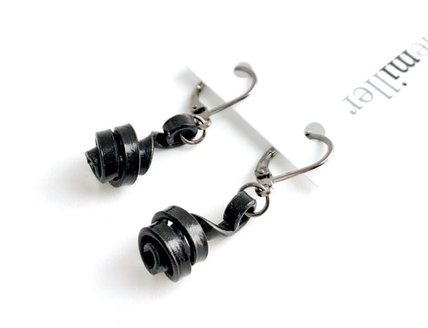 These Loopt earrings are super light weight and hang about 2cm long. They are made of aluminum wire.
