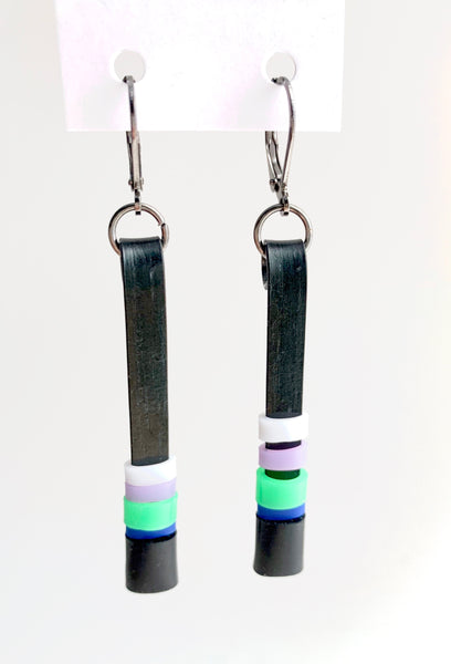 Matchstick earrings in black coloured aluminum wire with black, green, lavender, white and royal blue coloured silicone tubing. These hang 5cm in length.