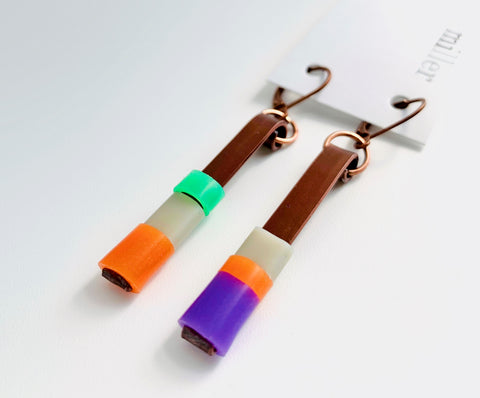 Matchstick earrings in bronze coloured aluminum wire with orange, purple, beige and green coloured silicone tubing. These hang 4cm in length. 